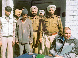 Rahul Kumar and Johny, accused of killing a local youth, being paraded before mediapersons at Salem Tabri police station