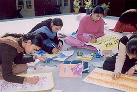 Students of the Malwa College for Women take part in slogan-writing competition