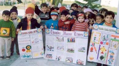 Kids of Chanda Mama Play School display various formats their school paper designed