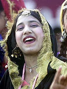 A folk dancer from Punjab performs giddha at Teen Murti House in New Delhi