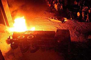 A diesel tanker catches fire and overturns below a flyover in Sion in central Mumbai