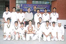 The Frank Anthony School, who annexed the R G Williams Cricket trophy, with school principal S DaCosta and former Delhi player Sunil Sudan.