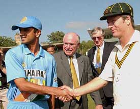 Indian Skipper Rahul Dravid and Australian PM XI's captain Steve Waugh with Australian Prime Minister John Howard