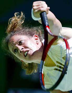 Patty Schnyder of Switzerland serves during her quarterfinal match against Lisa Raymond of the USA at the Australian Open in Melbourne