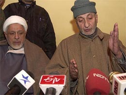 Former Chairman of the APHC Abdul Ghani Bhat (right) and Maulvi Abbas Ansari during a press conference at the APHC headquarters