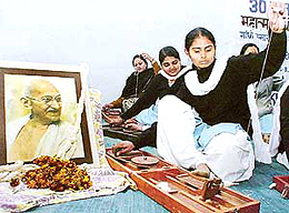 Girls spin the charkha on the Martyrdom Day of Mahatma Gandhi at Gandhi Smarak Bhavan in Sector 16, Chandigarh, on Friday.