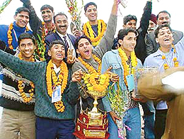 The Chandigarh volleyball team in a jubilant mood after winning the Junior National title in Kolkata on return at Chandigarh on Friday. 