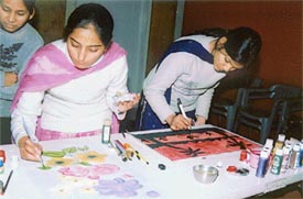 Students take part in a painting competition during �Ectopia-04� at the Dayanand Medical College and Hospital