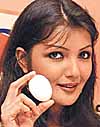 Former Miss India Shyla Lopez exhibiting a low-cholesterol, vegetarian egg at a Press conference in the Capital 
