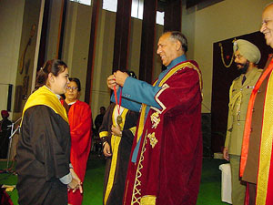 The Punjab Governor, Justice O.P. Verma, presents a medal to a student at the convocation of Hans Raj Mahavidyalaya in Jalandhar
