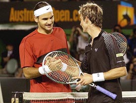 Switzerland's Roger Federer is congratulated by Spain's Juan Carlos Ferrero following their semifinal match at the Australian Open in Melbourne 