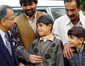 Pakistani boys Afzal and Rohit and their family members being welcomed by Mr R.K. Saboo, Past Rotary International president, on their arrival for heart surgery at the PGI in Chandigarh