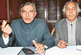 Mr Pawan Kumar Bansal, MP, addresses a press conference in Chandigarh on Saturday. Mr B.B. Behl, President, Chandigarh Congress, is also seen