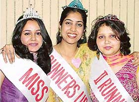Priyanka Goswami, Gurleen and Neha Mahajan (from left to right) after being crowned during a farewell party of Sector 15, DAV School, in Chandigarh