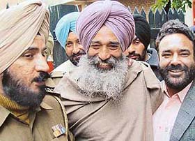 Main accused in Burail jailbreak case Narain Singh Chaura being taken out of the District Courts complex, Chandigarh