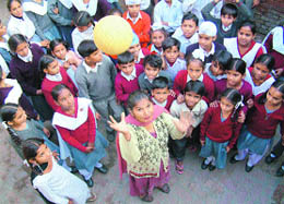 Satpal Kaur with her students