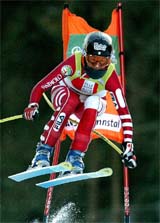 Isolde Kostner of Italy is airborne on her way to win the Women's World Cup downhill race in Haus