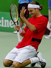 Second seed Roger Federer of Switzerland celebrates his win over Russia�s Marat Safin in their men�s final match at the Australian Open