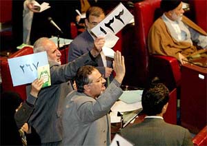 Members of Iran's Parliament who handed in their resignations, protest at the continued parliamentary session in Tehran