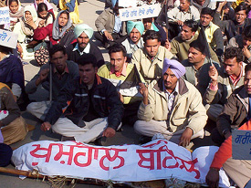 Unemployed elementary teachers protest against the state Education Minister in Patiala