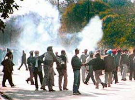 The Chandigarh Police uses teargas to disperse members of the Punjab State Electricity Board Employees Forum at Matka Chowk, Chandigarh