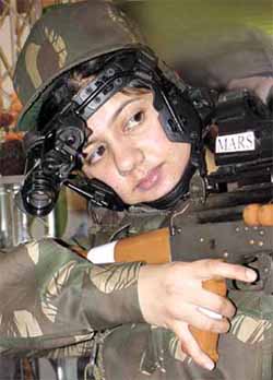 A woman in an army commando dress during the Defexpo