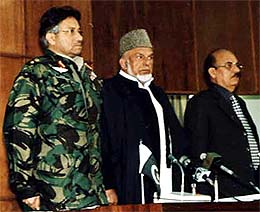 Pakistan President Pervez Musharraf attends the assembly session with Sardar Anwar