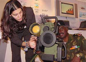An Israeli exhibitioner explains the functioning of the new generation Multi-Purpose Missile System 