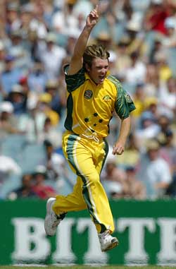Australia's Ian Harvey celebrates after dismissing India's Rahul Dravid during the first final in Melbourne