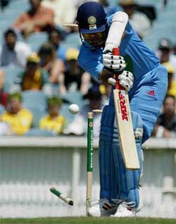 Sachin Tendulkar is bowled for eight runs by Australia's Brett Lee 