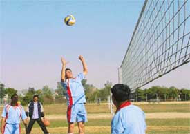A spiker of Uttaranchal in action in a match against the Himachal Pradesh zone in the North Zone Employees Provident Fund Organisation Meet in Ludhiana