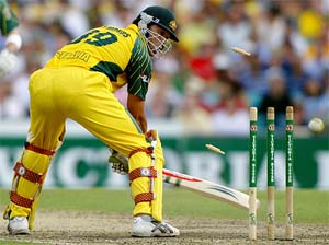 Andrew Symonds is bowled for 66 runs by Ashish Nehra