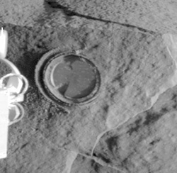 This image, released on Saturday, shows a round, shallow depression resulting from history�s first grinding of a rock on Mars