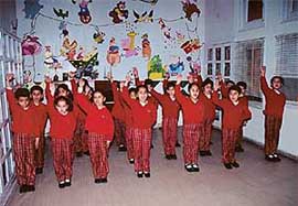 Tiny-tots of Strawberry Field regales their parents with songs in Sector 24 on Monday.