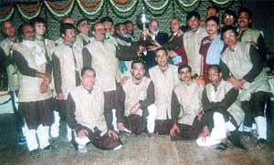 PNB General Manager presenting the trophy to the winners of the 21st All India PNB Inter Zonal Cultural Meet, 2003-2004