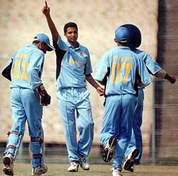 India under-19 bowler VRV Singh (C) celebrates after dismissing Australian batsman T. Doropoulous at Eden Garden in Kolkata 