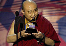 Tenam Lama accepts the award for best traditional world music album 