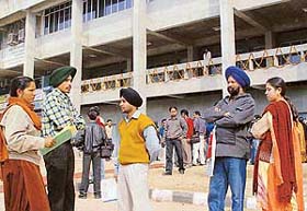 Passport seekers wait impatiently outside the Regional Passport Office in Sector 34 as no public dealing work was undertaken
