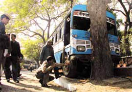 At least half a dozen passengers were injured then a Blue Line climbed the sidewalk and rammed into a tree near the YWCA in the Capital on Tuesday.