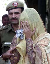 The alleged impersonator being produced at the Patiala House Courts