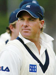 Suspended Australian spinner Shane Warne leaves the field at lunch break after his return to first class cricket with Victoria's 2nd XI 