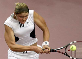 Dinara Safina of Russia hits a backhand return to Jelena Jankovic of Serbia Montenegro 
