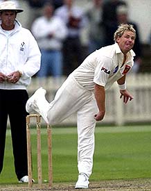 Australian spinner Shane Warne bowls during a first class match between Victoria�s 2nd XI and Queensland Academy 
