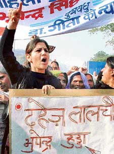 Dr Geeta Garewal, daughter-in-law of Mr Bhupinder Singh Hooda, Leader of Opposition in the Haryana Vidhan Sabha, protests at Matka Chowk 