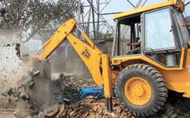 Demolitions at Yamuna Pushta, following the High Court order paving the way for evictions and rehabilitation of the oustees in the Capital on Friday.
