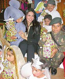 Nikita Anand, Miss India-2003, interacts with kids at a function on the occasion of Cancer Survivors Day in DAV College, Sector 10, Chandigarh