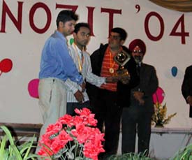 Anupreet Bassi of Government Medical College, Patiala, receives a trophy on the concluding day of the three-day North Zone Inter-Medical Colleges Indoor Games