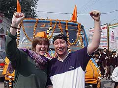A Scottish couple raise religious slogans during a procession organised by Arya Samaj on the eve of Shivratri in Amritsar 