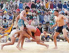 Thousands of spectators watch the India-Pakistan kabaddi match held at Chakwal Stadium, Kurali