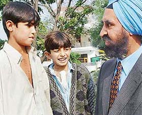 Two Pakistani boys, Afzal and Rohit, with Dr R.S. Dhaliwal in Chandigarh